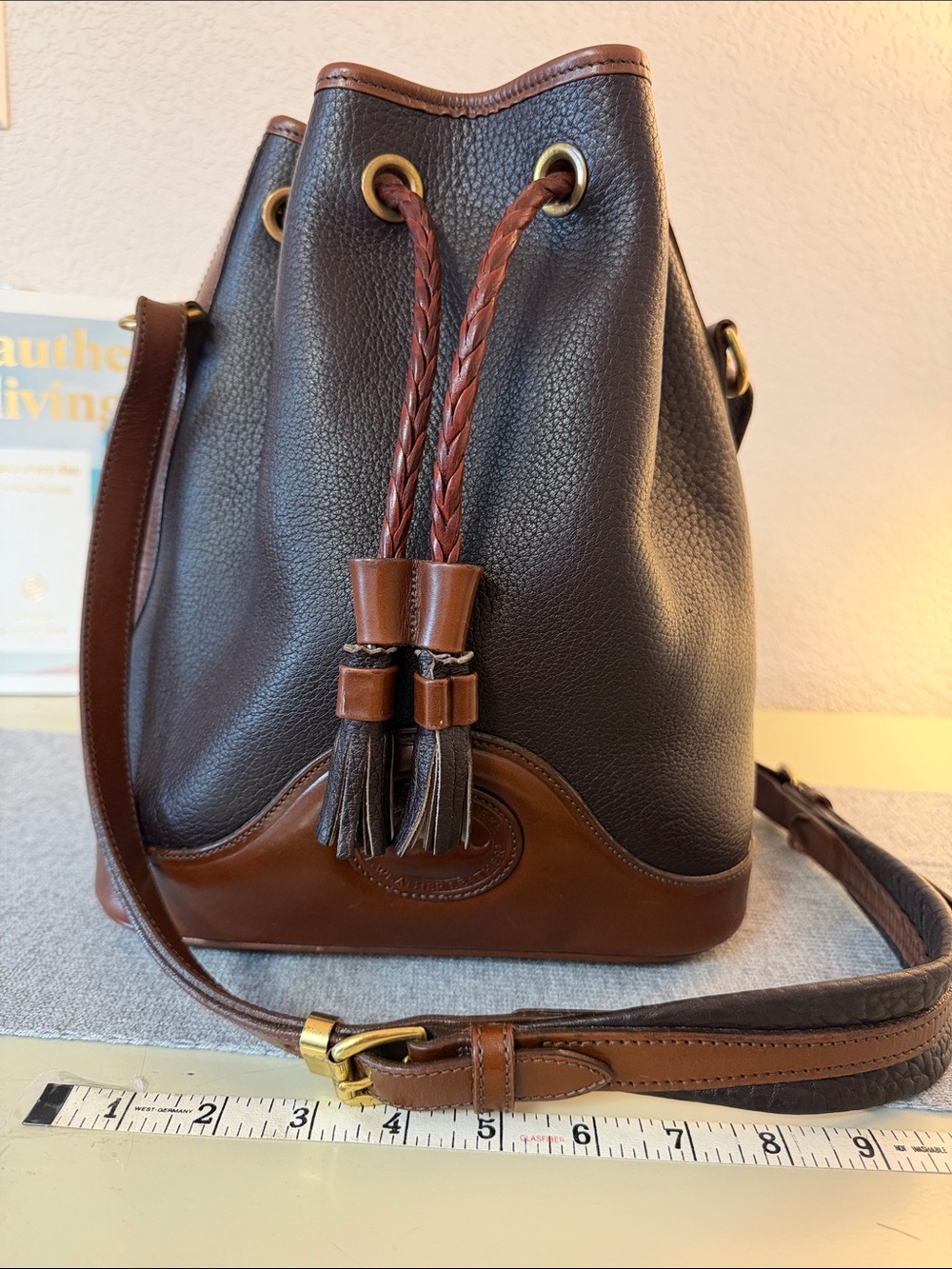 Dooney & Bourke Black and Brown Leather Drawstring Bucket Bag